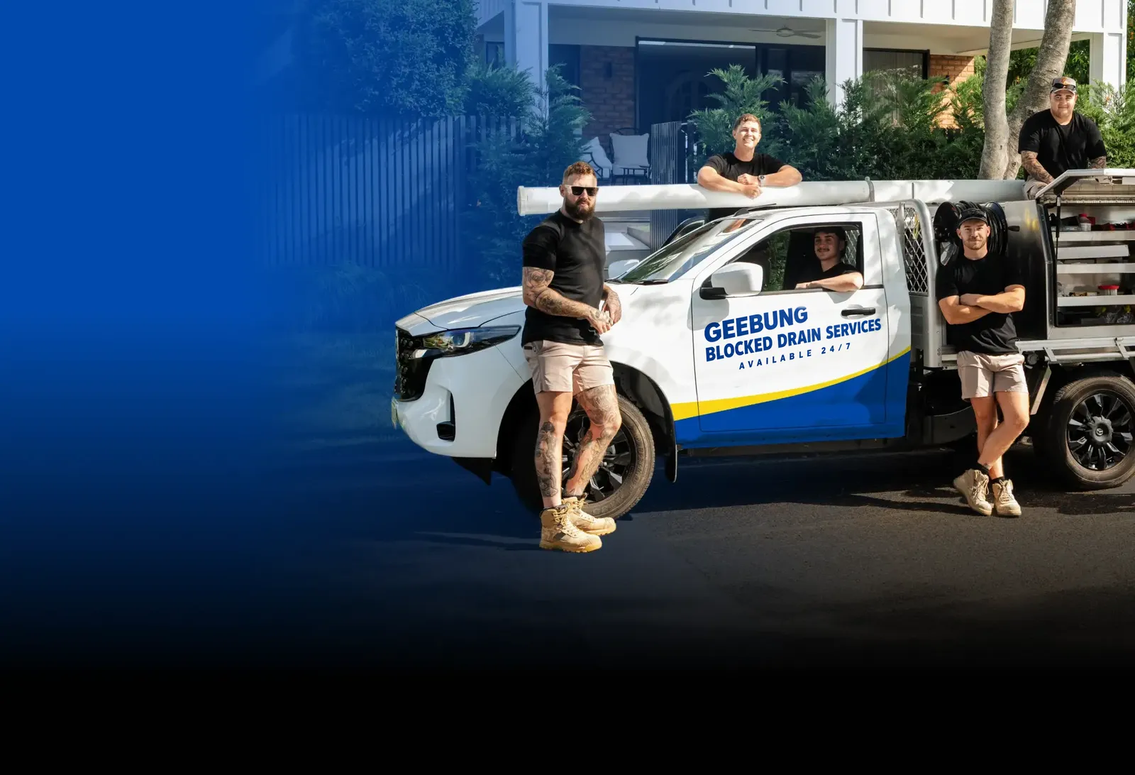 Geebung Blocked Drain Services team with the ute